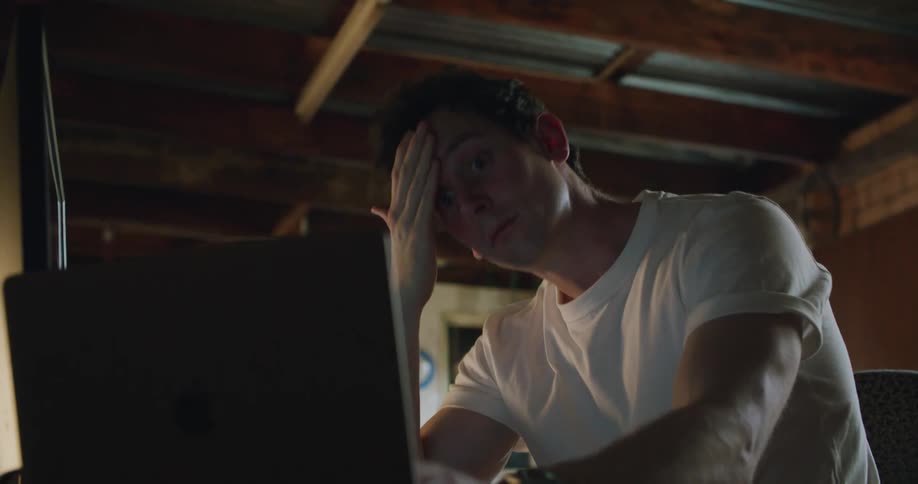 A man typing on a computer