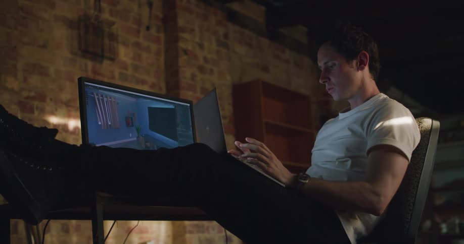 A man typing on a computer