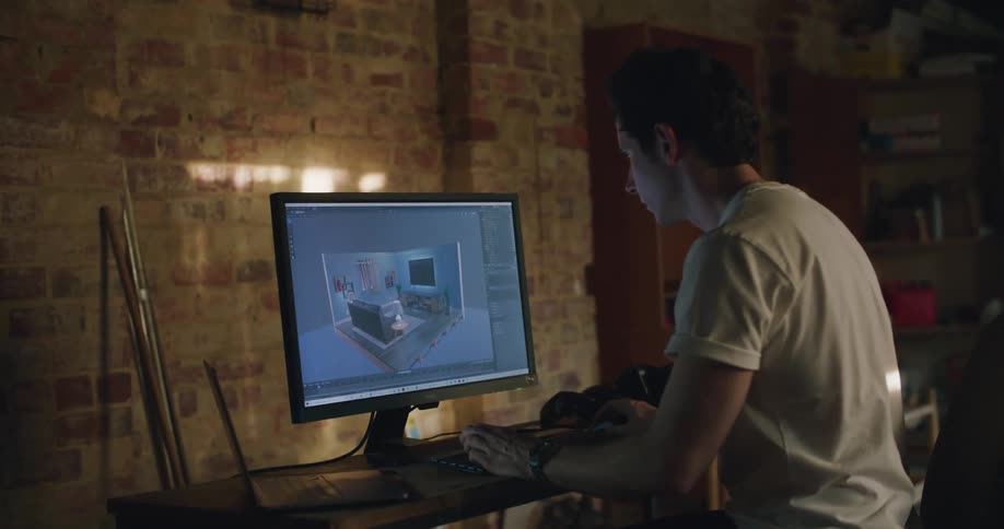 A man typing on a computer