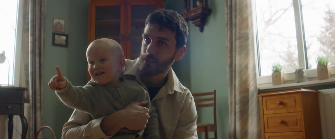 A father holding his son