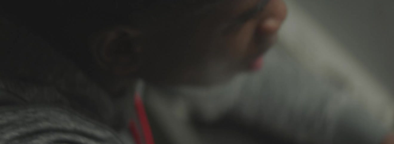 A man working on something and talking