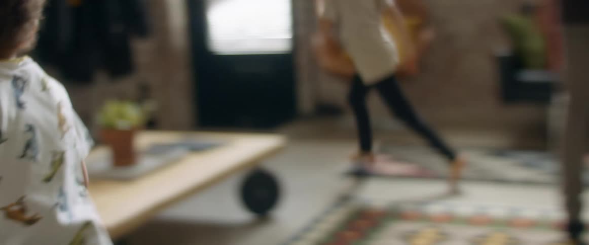 Father playing with his son and daughter on the kitchen at home
