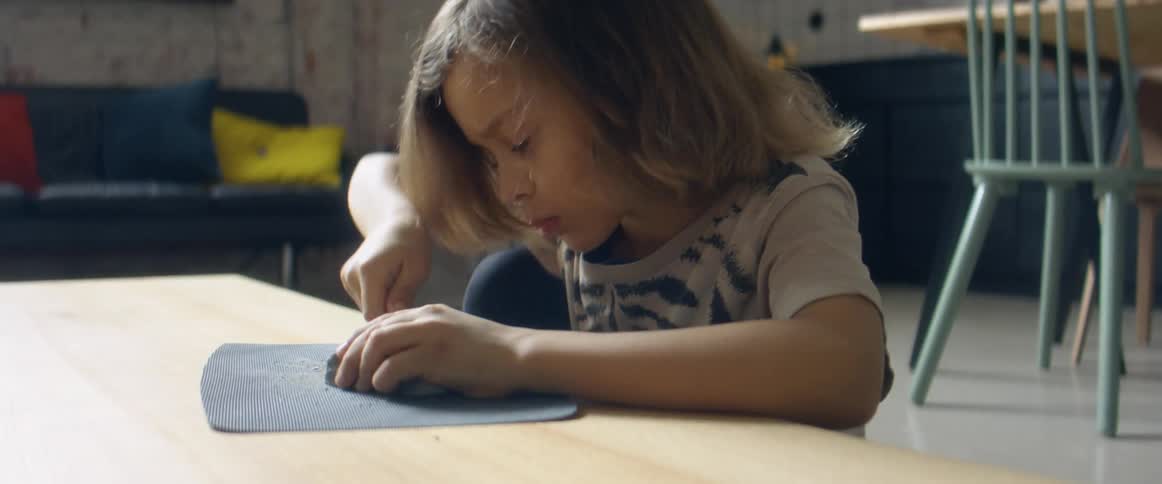 A child coloring on some things
