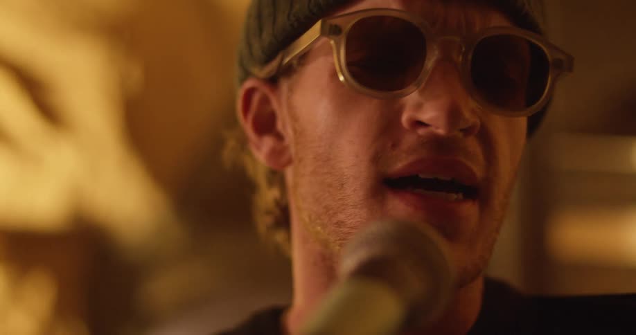 A man singing into a microphone