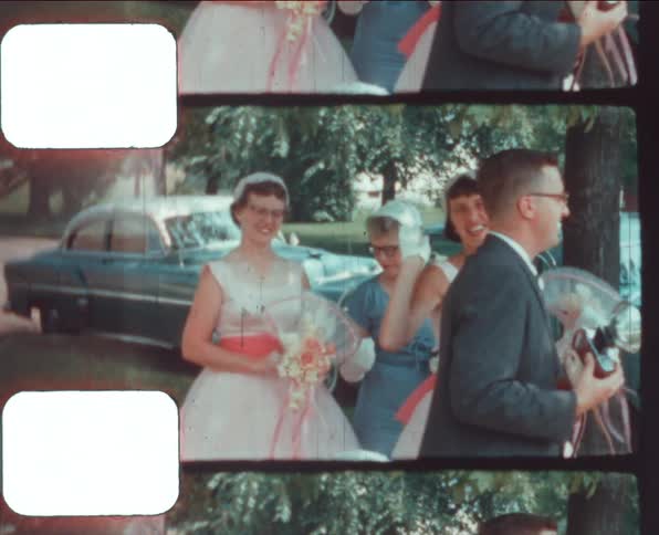 People at a wedding waiting for the groom and bride caught on vintage film