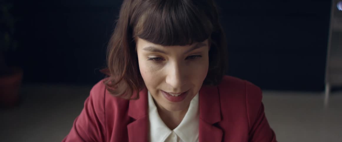 An employee talking in an office