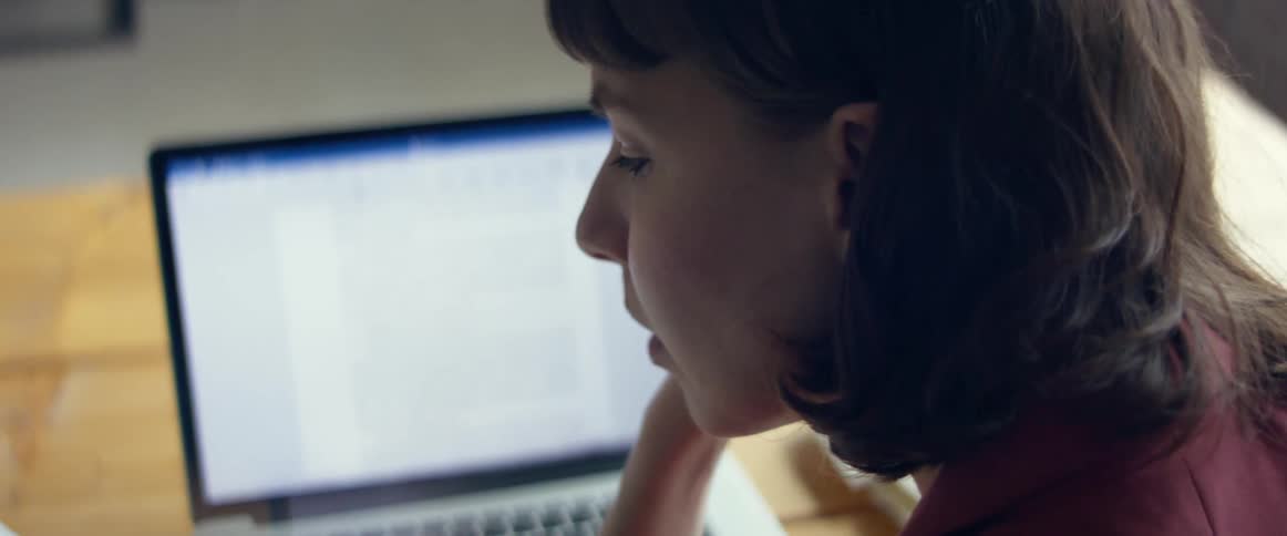 A woman working on a laptop