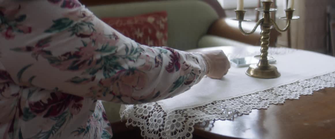 A woman playing solitaire