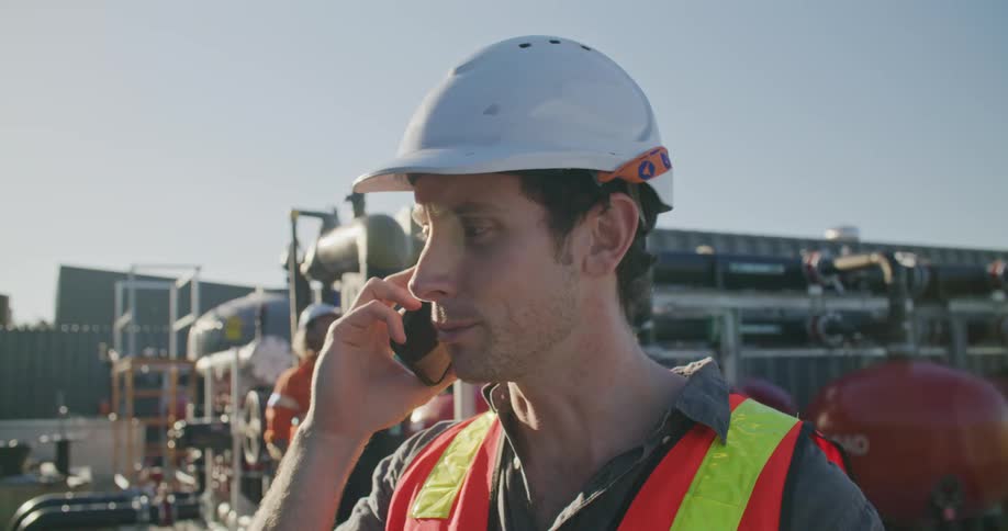 Two workers on a construction site