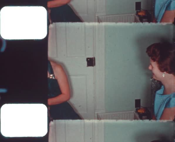 Two women talking to each other at a party