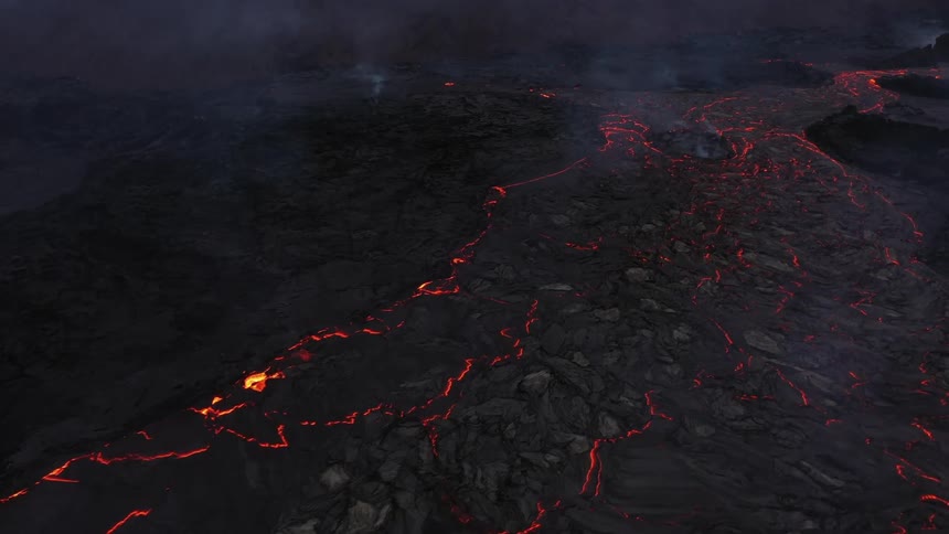 The ground with molten lava smoke and rocks