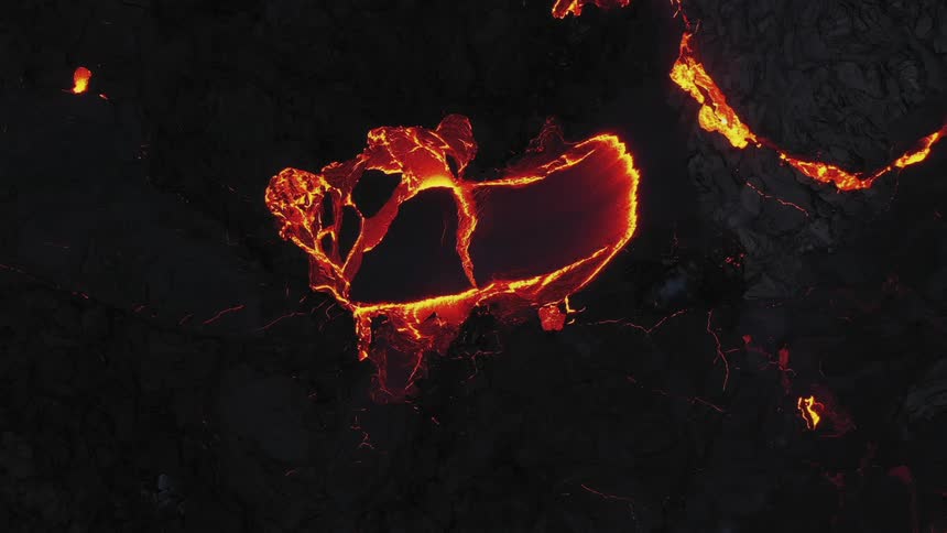 Hot molten lava flows from volcano