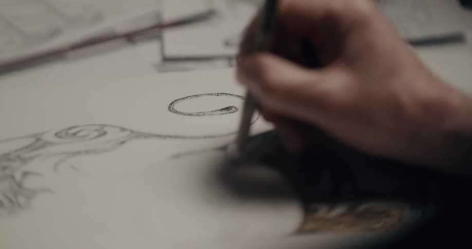 A person drawing and painting