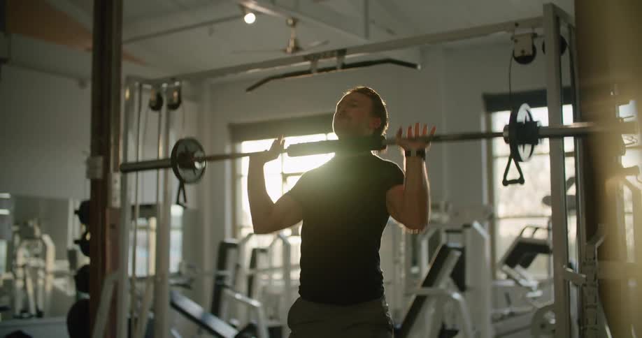 A man lifts weights