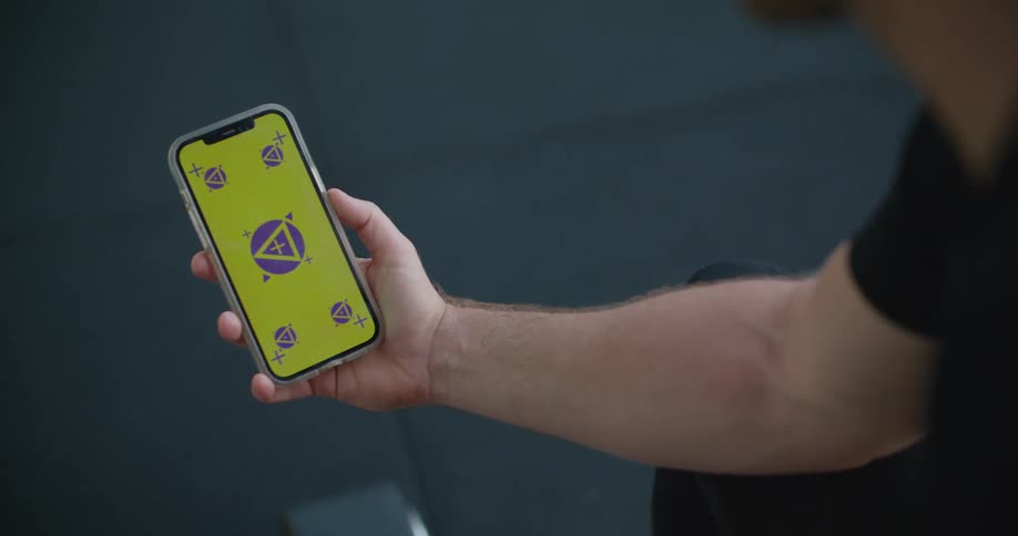 A man holding a smartphone in his hands