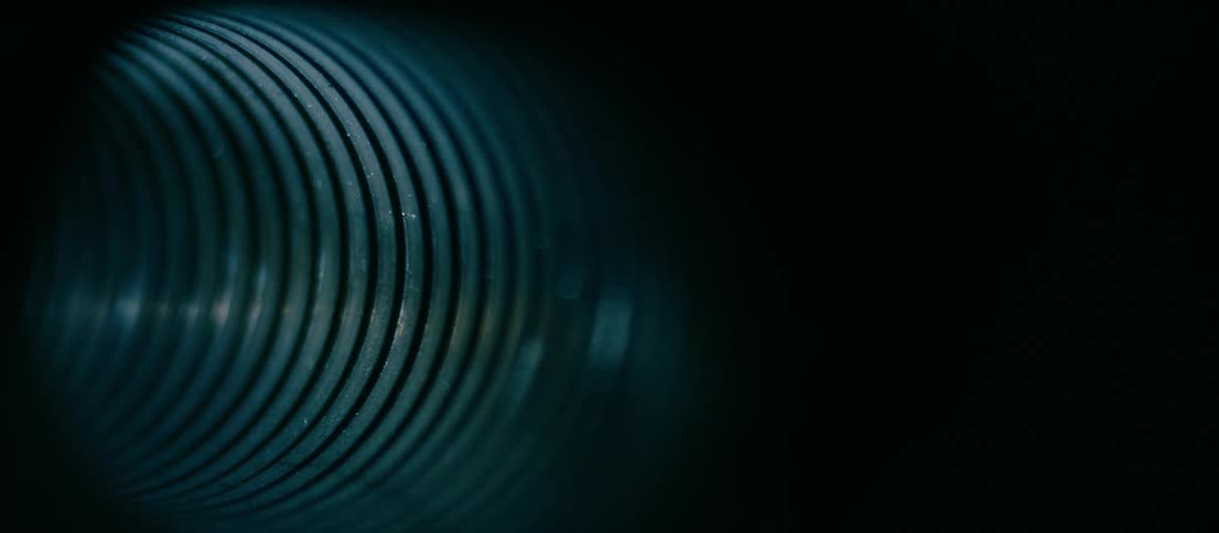Light shining down a dark tunnel