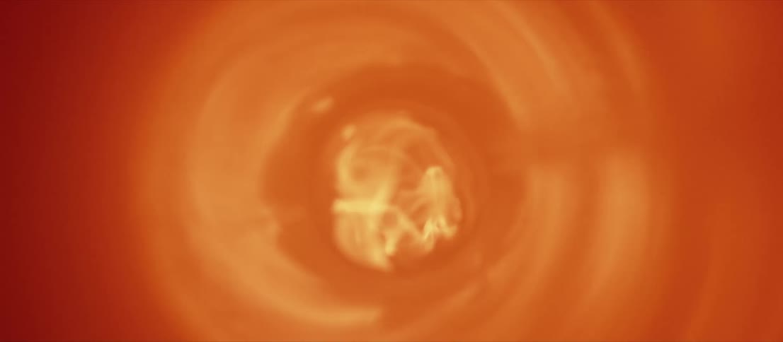 Red flames bounce on the walls of a metallic cyclinder