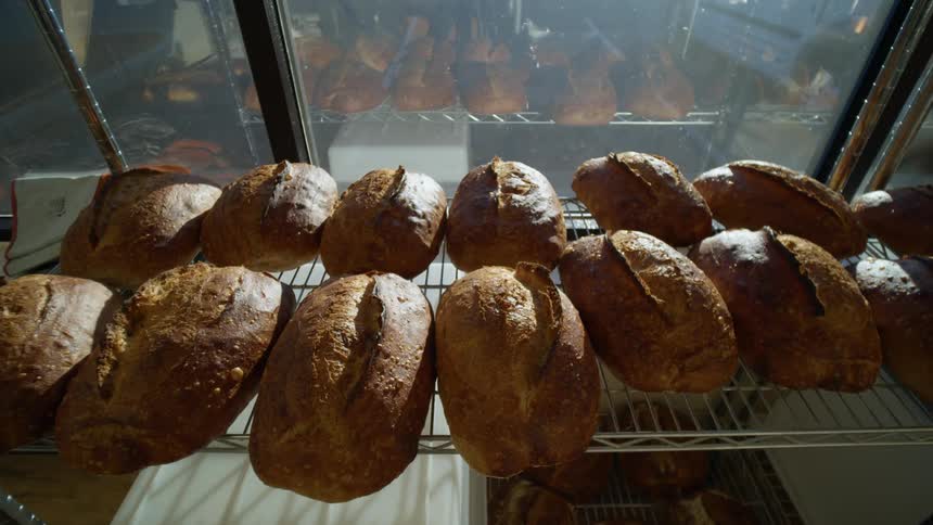 Loaves of bread on the shelves at the bakery