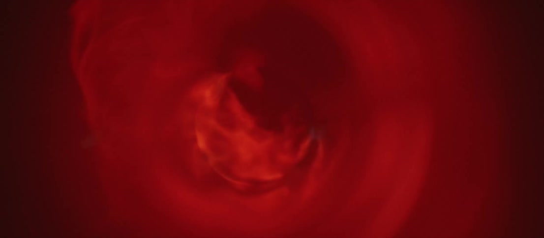 Red flames licking the walls of a metallic cyclinder