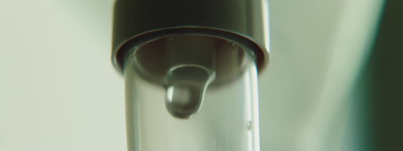 Liquid dripping inside glass