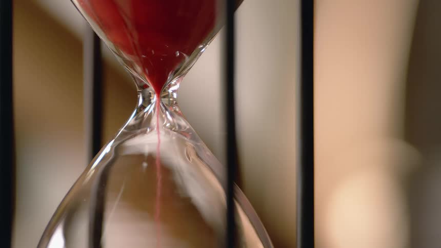 Sand falling through a hour glass