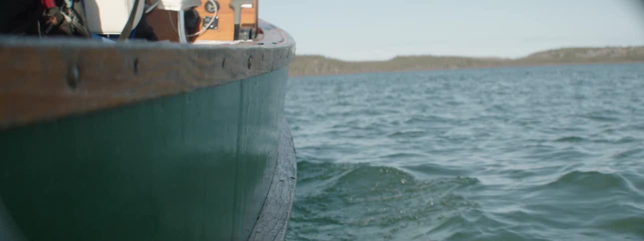 A boat floating on a lake