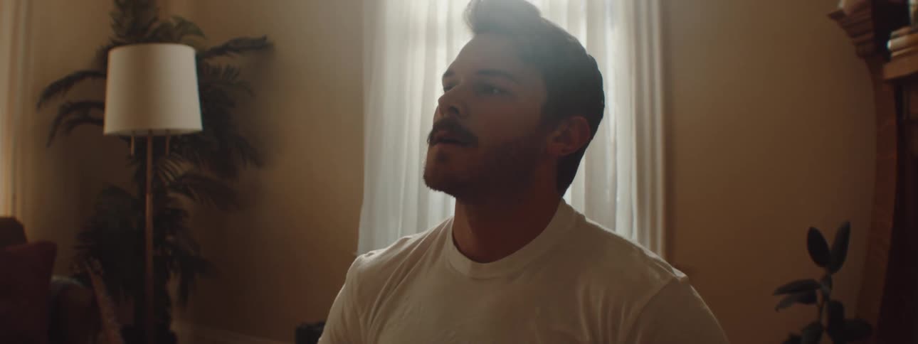 Man sitting down breathing