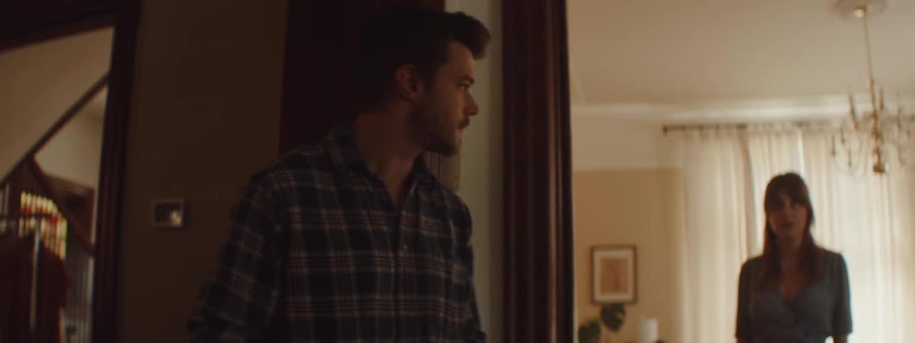 Two people that are arguing in a house
