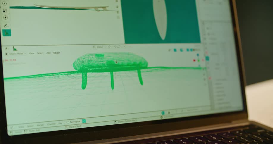 A surfboard design simulation on a computer screen