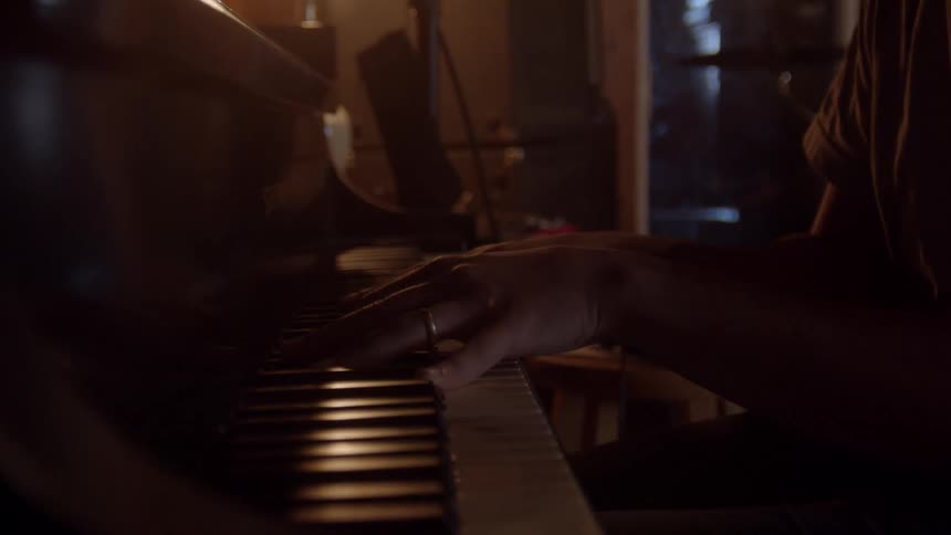 A man plays the keyboard