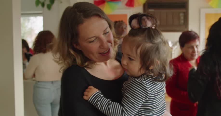 A mother and daughter at a party