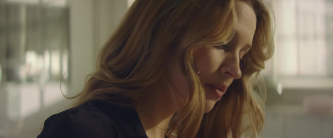 Close up of a blonde woman face