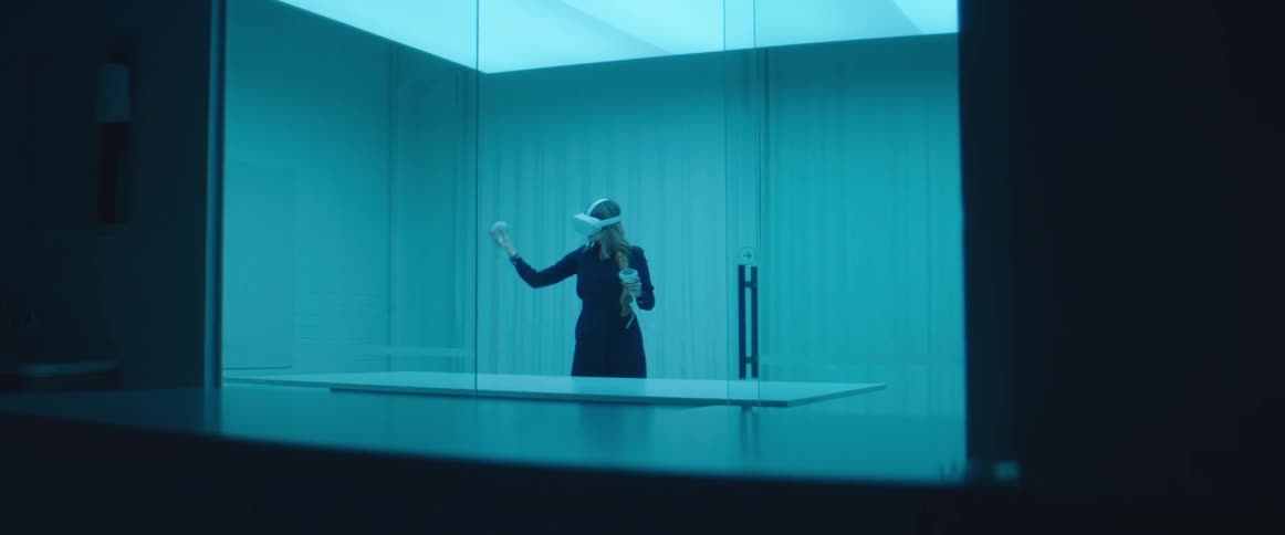A woman playing with a vr headset