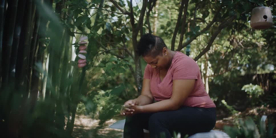 A woman sitting on a bench