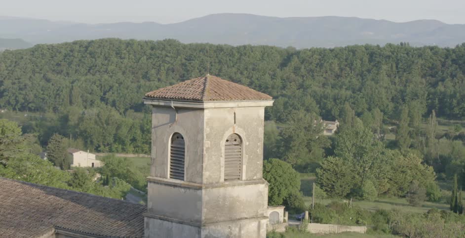 View of the top of a building with a tower