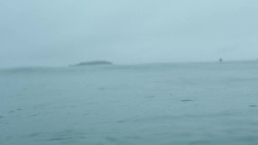 Rain is falling into the ocean as the water moves