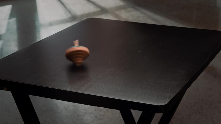 A top spinning on a table
