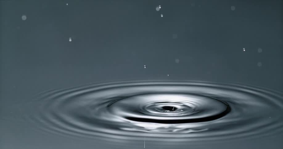 A drop of water falling and making a ripple