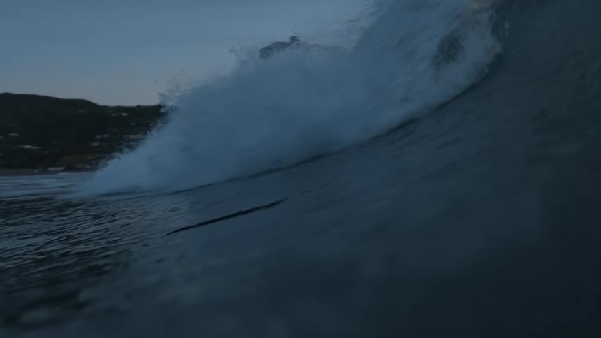 Waves Crashing At Sunset