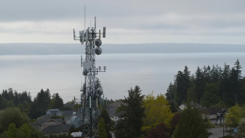 Orbit around a cell site in a suburban neighborhood near coastal shoreline