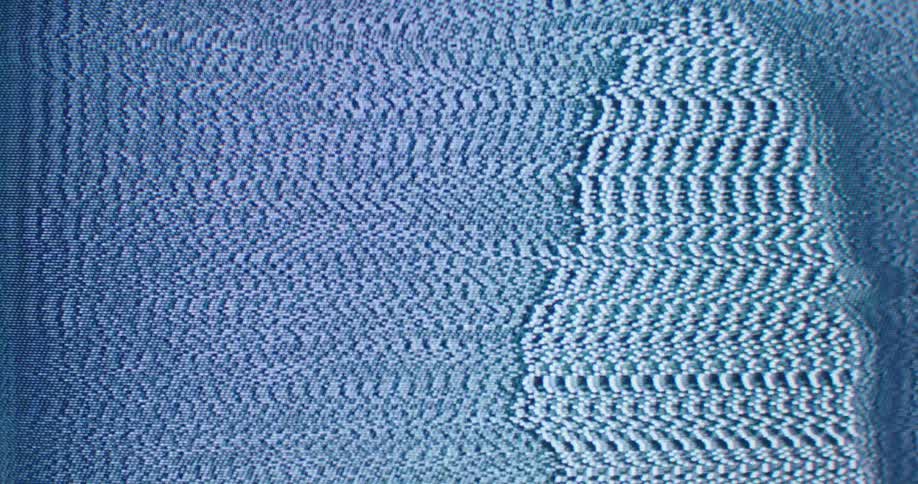 A woman is moving on the static filled screen