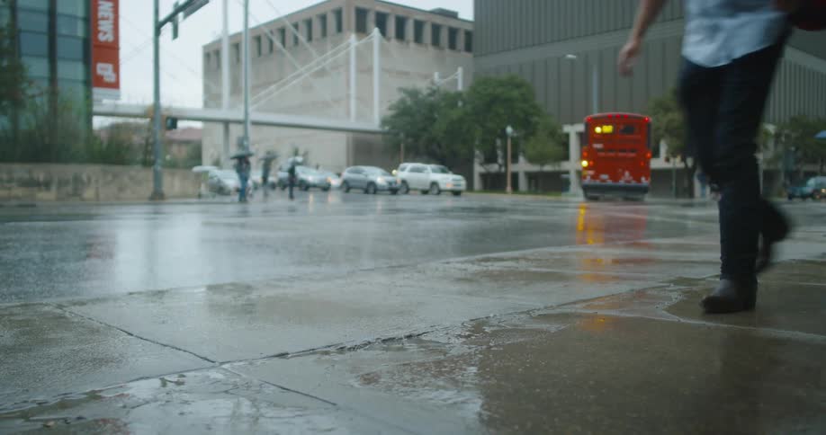 A city street ion the rain