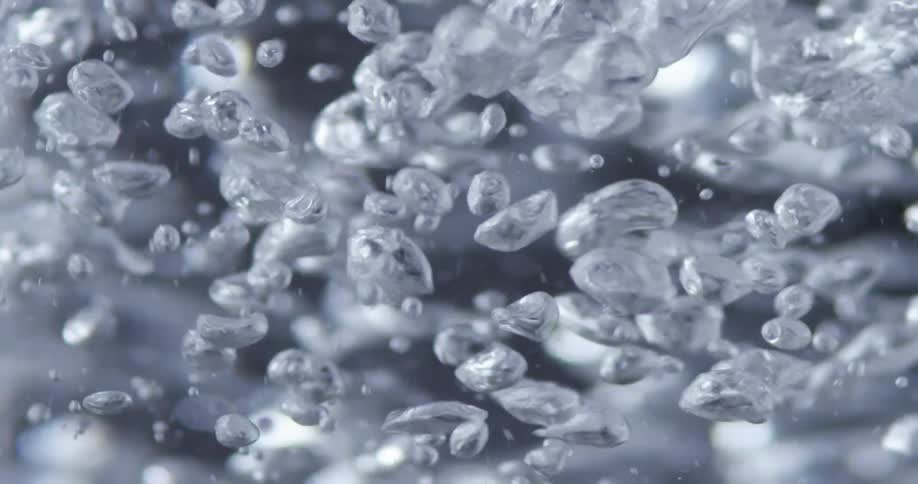 Water droplets in a glass are moving