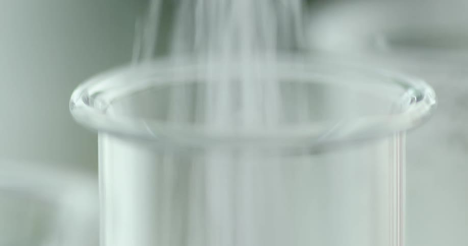 Salt in a room falling into a container