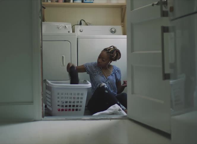 A woman doing laundry