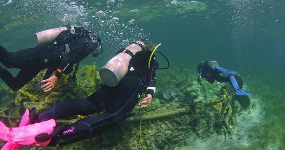 Scuba divers explore underwater