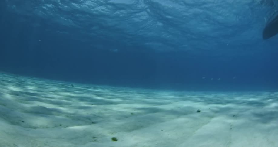 The sky is cloudy above this body of water