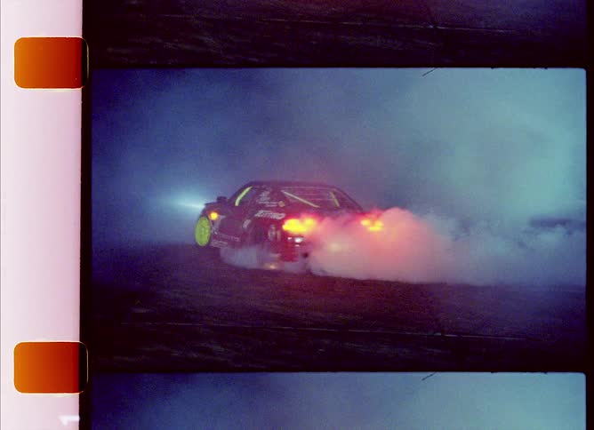 A car drifting around at a rally
