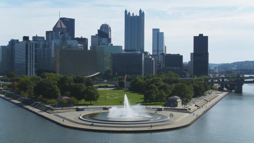 Aerial shot of a city skyline during a sunny day