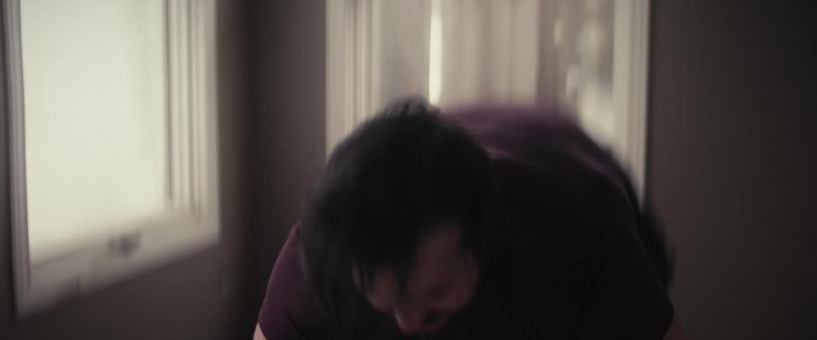 A man doing exercises in a room